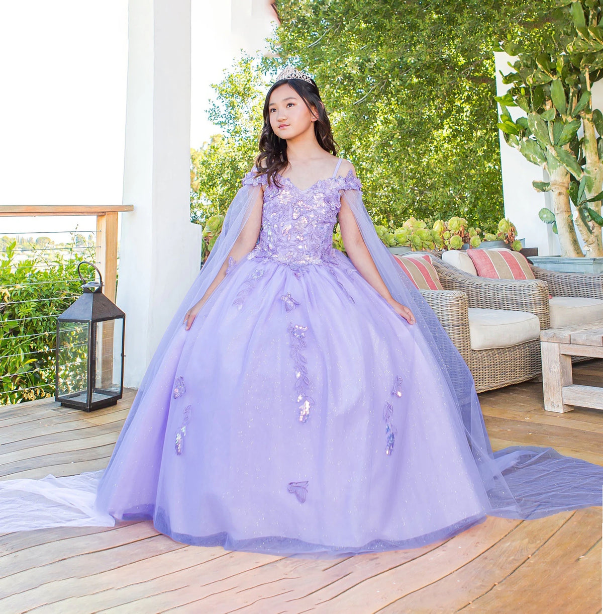 Front view of lilac mini quince dress with floral butterfly applique glitter tulle skirt.