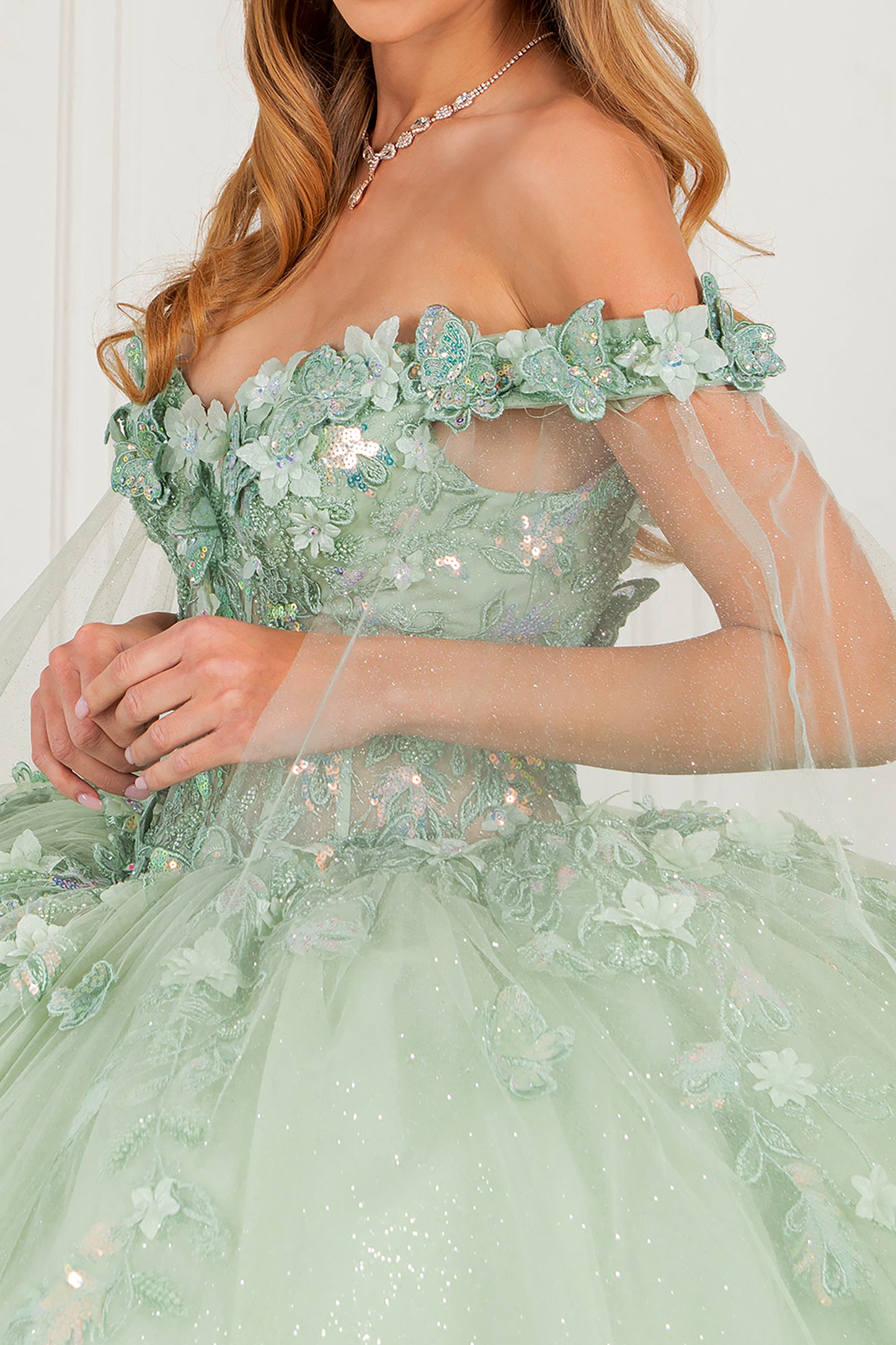 Quinceañera | Sage Off-Shoulder Embossed Tulle Satin Two-Tone Sequin Floral Appliqué Bodice with Detachable Long Sleeves Train Sweet 15 Ball Gown | Roma J dress | 3 Colors Available side view