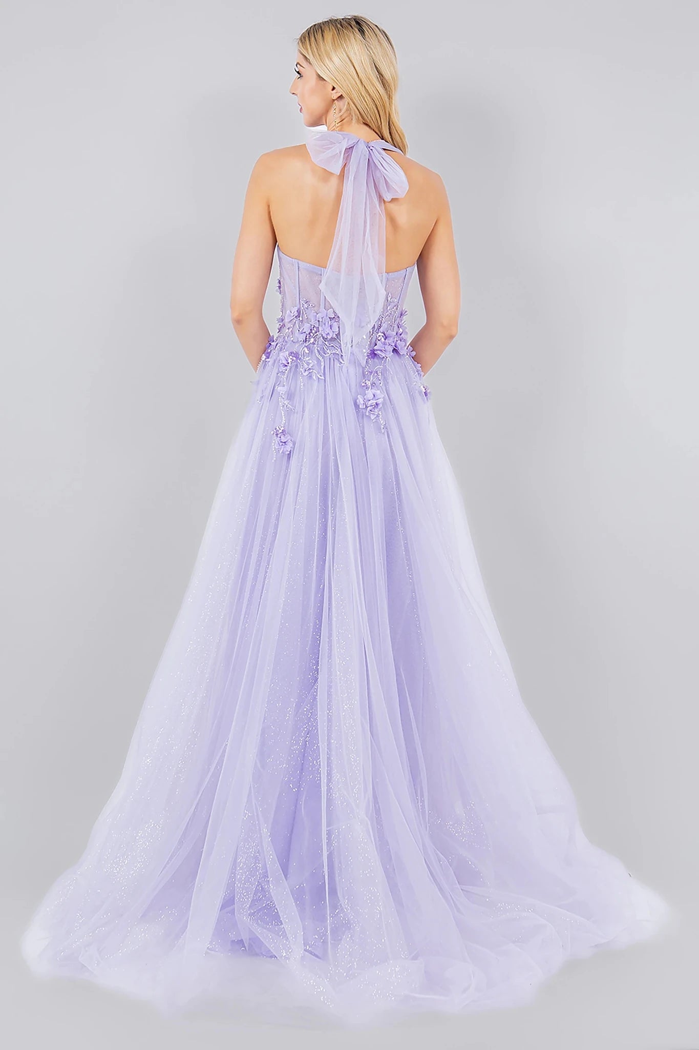 Lilac prom dress styled with halter neck tie closure