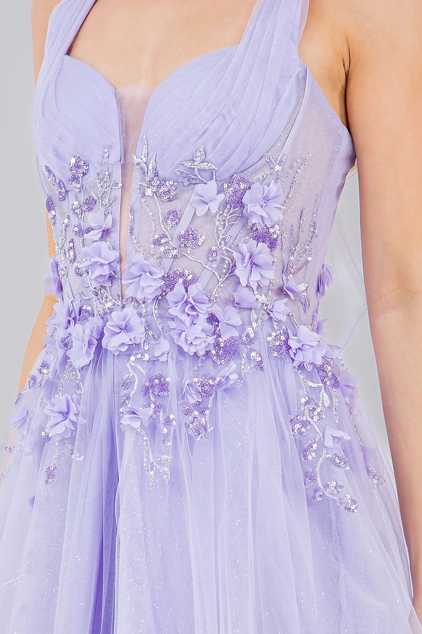 Lilac prom dress featuring floral appliques and glitter print pattern