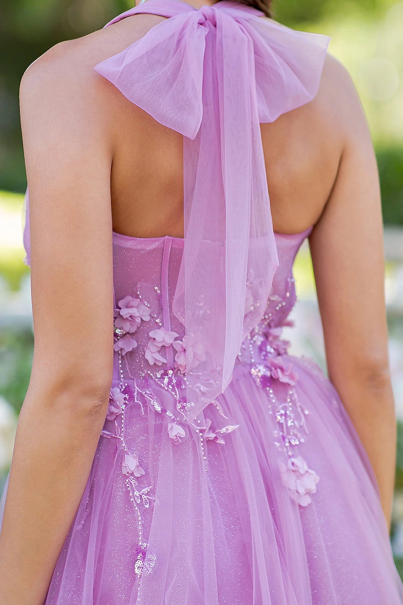 Pink prom dress completed with zipper back closure for fitted finish
