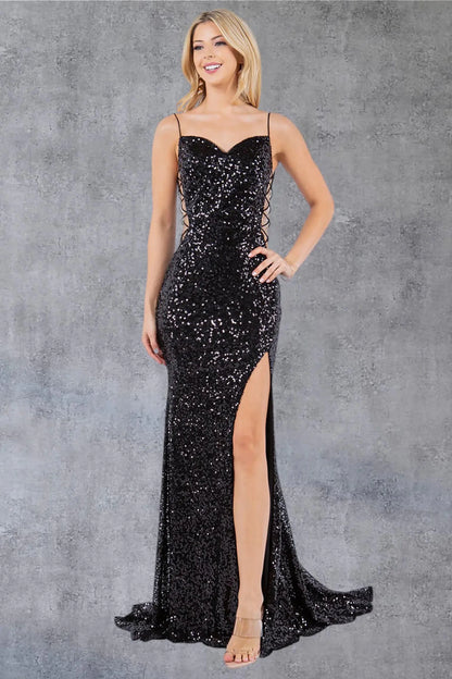 Full front view of a women wearing black sequin prom dress with fitted bodice, cutouts, and high slit.