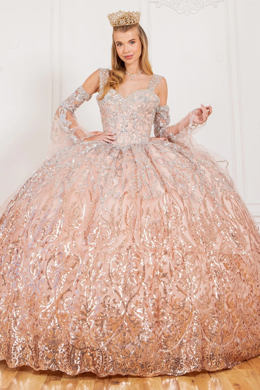 Shown in a front view, the Peach Blush quinceañera dress has beaded sweetheart bodice and patterned sequin ball skirt.