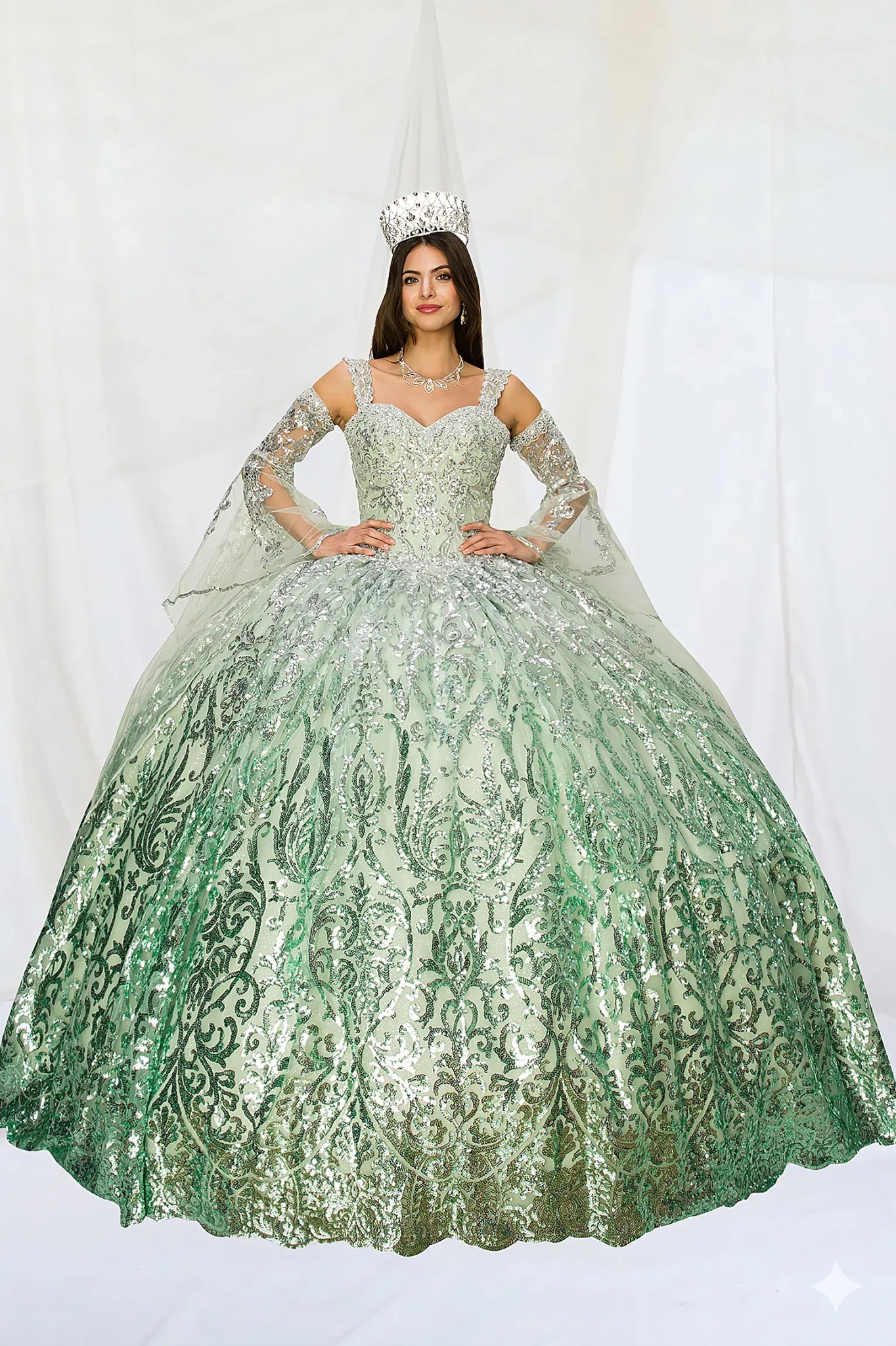 Woman in a green and silver sequin embroidery all over formal quinceanera ball gown and detachable  sequin embroidery long sleeves