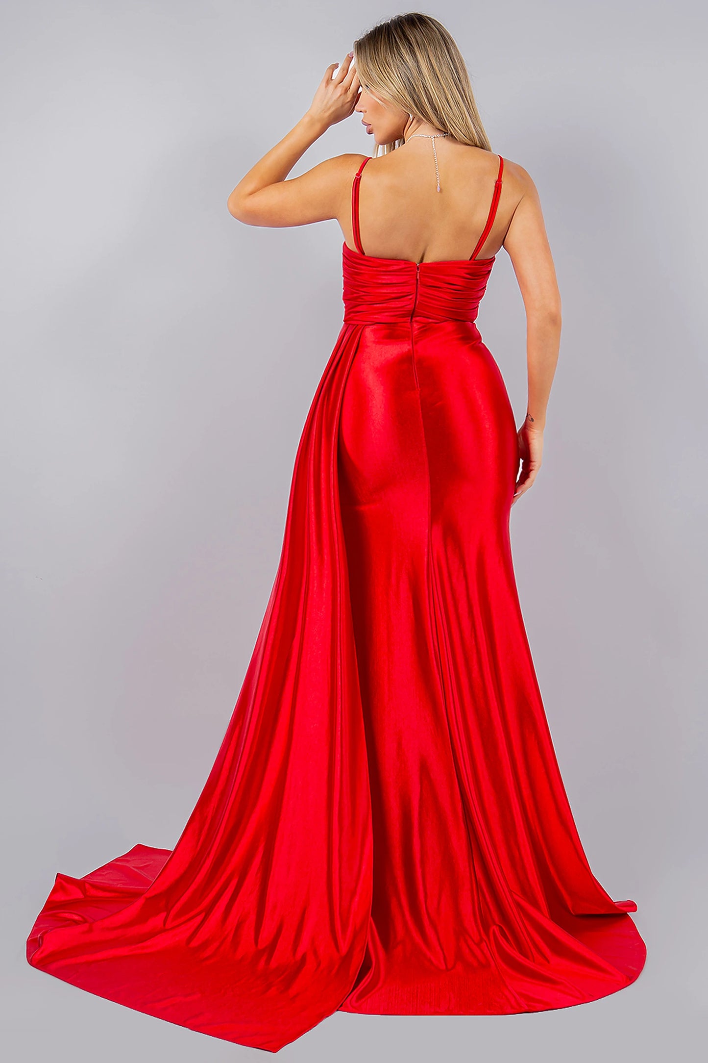 Red evening dress designed with zipper back closure and structured fit