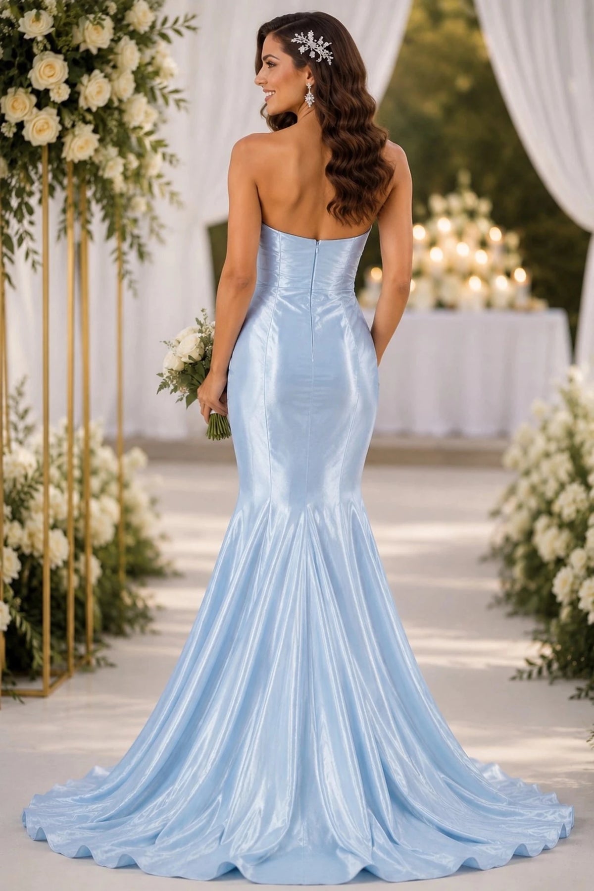 Textured details appear across strapless light blue mermaid gown with a fitted bodice, and a full flared skirt with a long train.