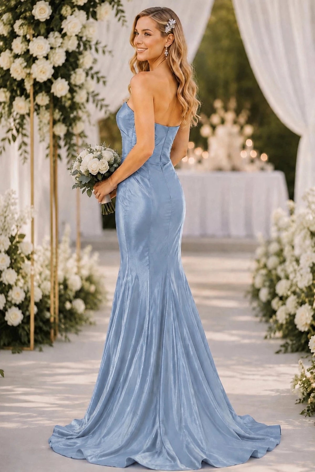 Rear view reveals strapless Dusty Blue mermaid-style evening gown with zipper back.