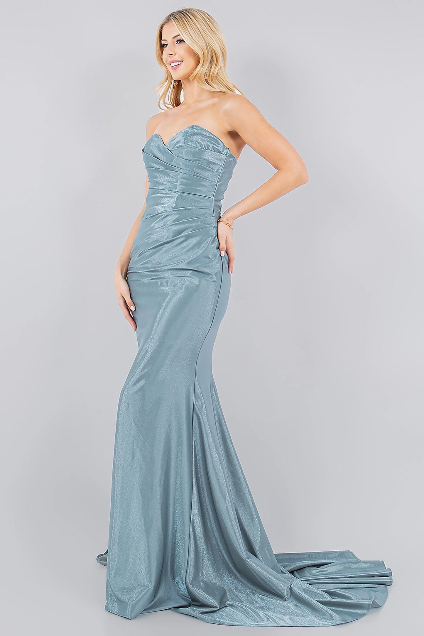 Sage prom dress completed with horsehair-trimmed hem and train