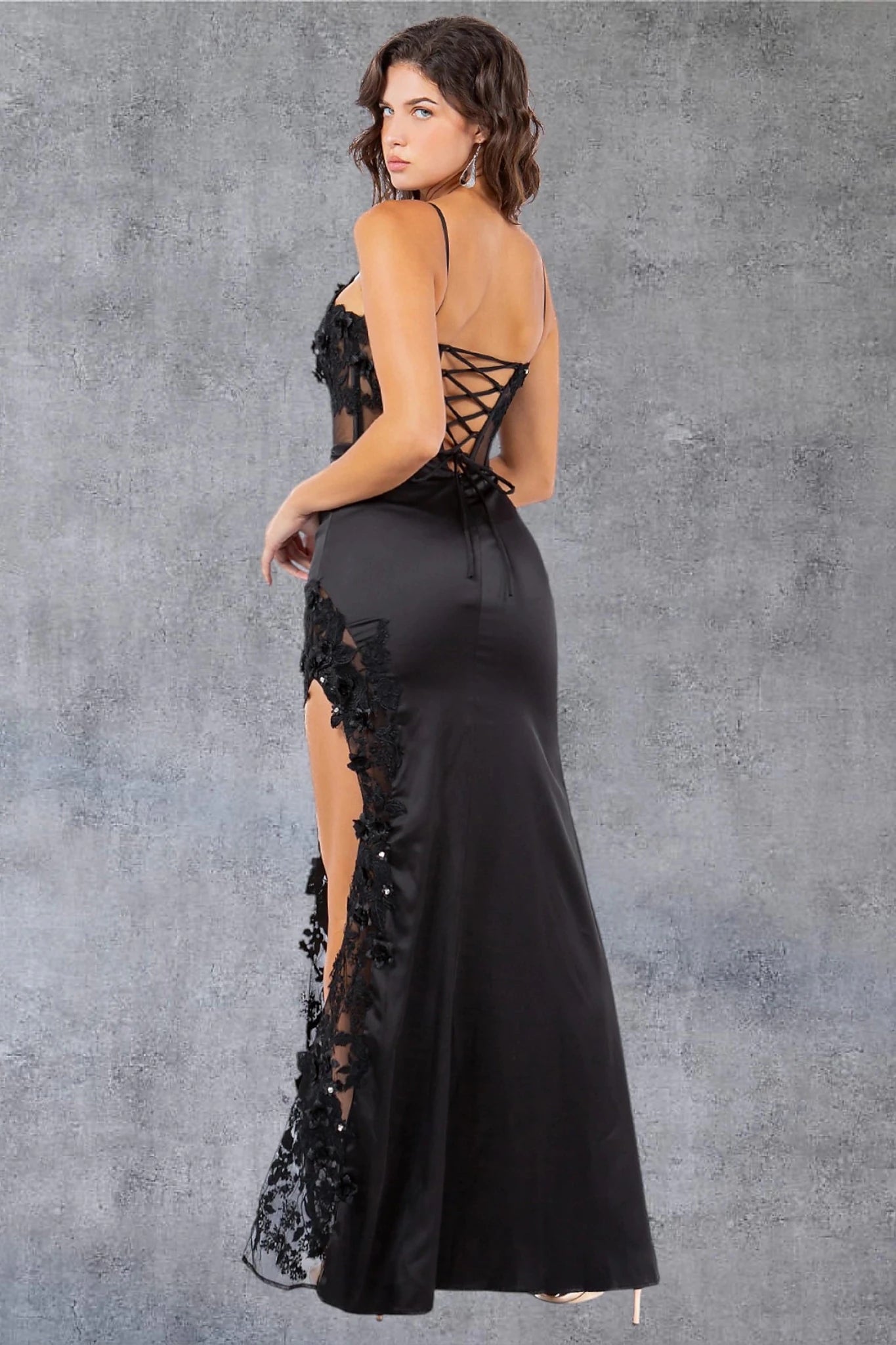 Black spaghetti strap gown showcasing corset back closure for adjustable fit