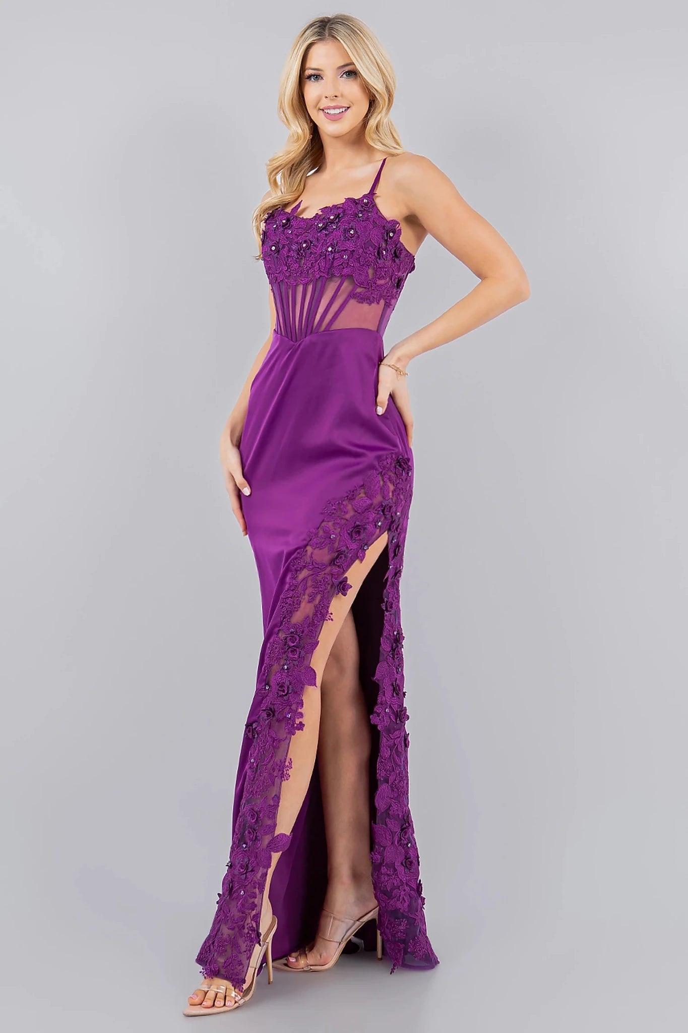 Grape spaghetti strap gown styled with side leg slit and sheer lace detail
