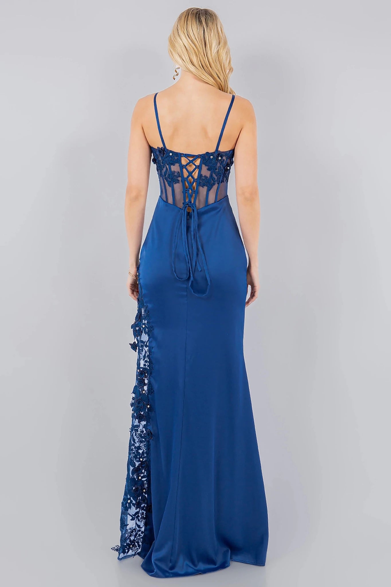 Blue spaghetti strap gown showcasing corset back closure for adjustable fit
