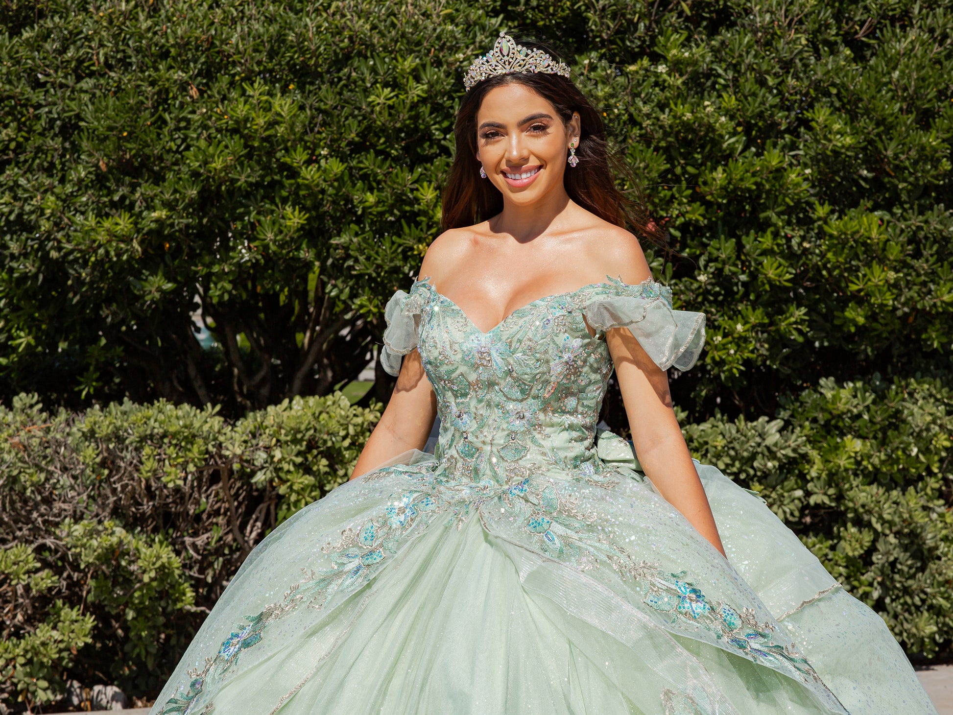 Quinceañera | Sage Off-Shoulder Illusion Corset Bodice Embellished with Sequin Lace Appliqués and Train Sweet 15 Ballgown | Valeria dress front zoom with tiara