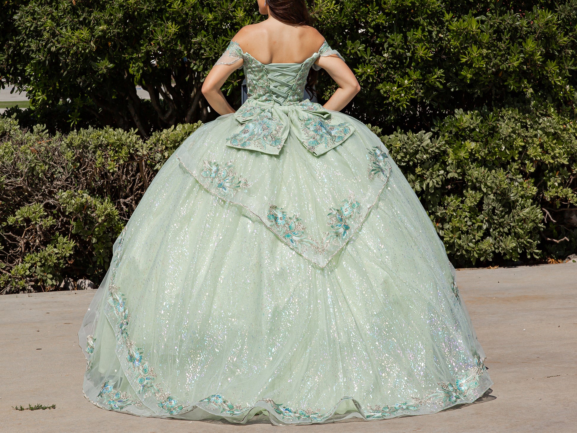 Quinceañera | Sage Off-Shoulder Illusion Corset Bodice Embellished with Sequin Lace Appliqués and Train Sweet 15 Ballgown | Valeria dress back view