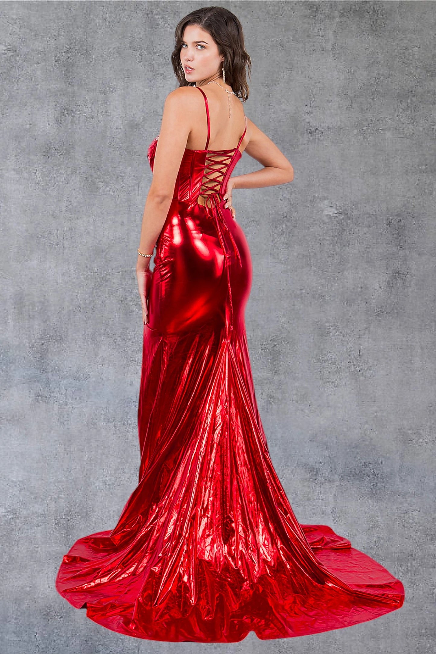 Red prom dress showcasing trumpet silhouette with floor-length skirt and lace up back