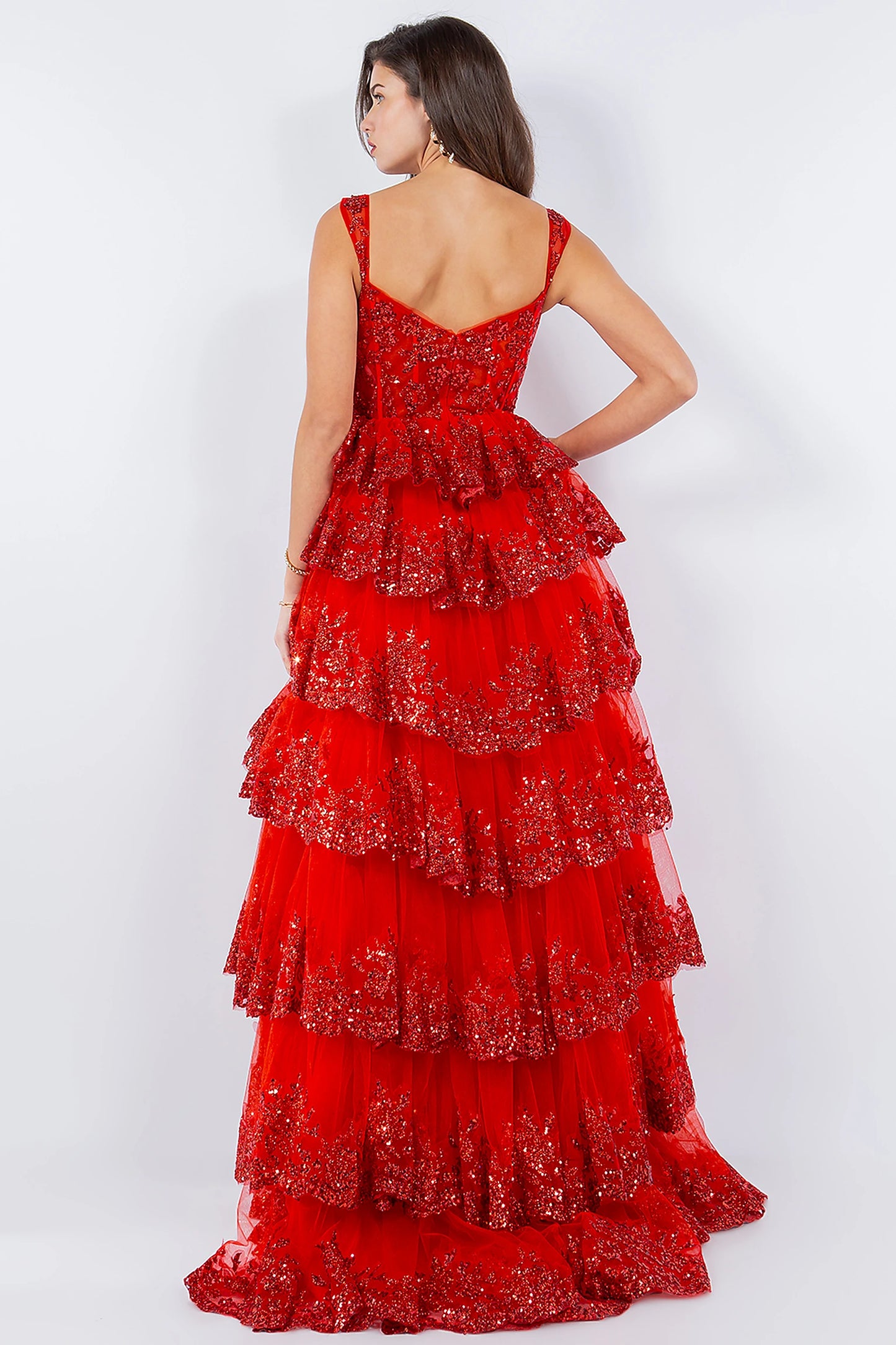 Red prom dress designed with zipper back closure