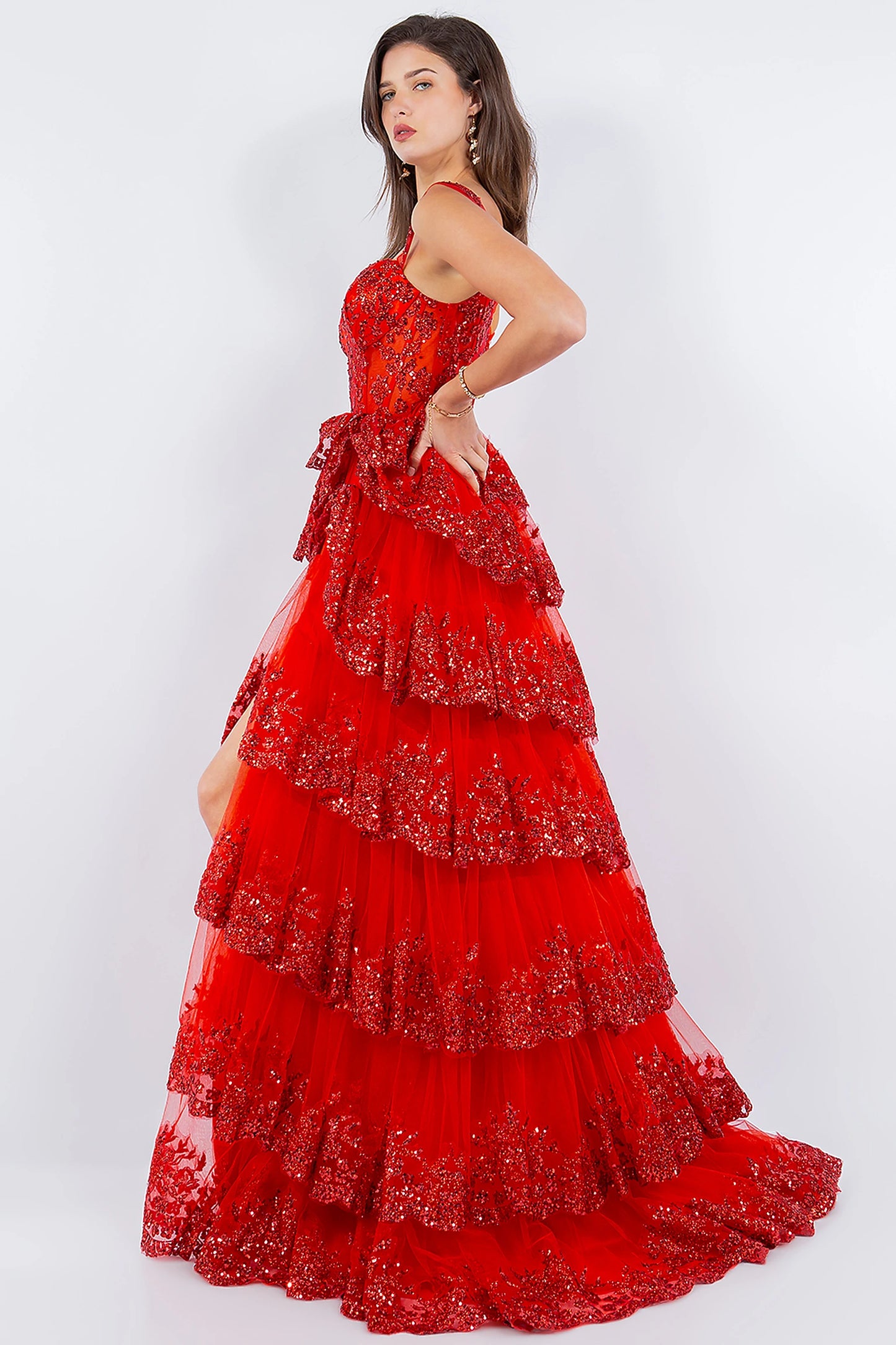Red prom dress completed with floor-length silhouette and sweep train