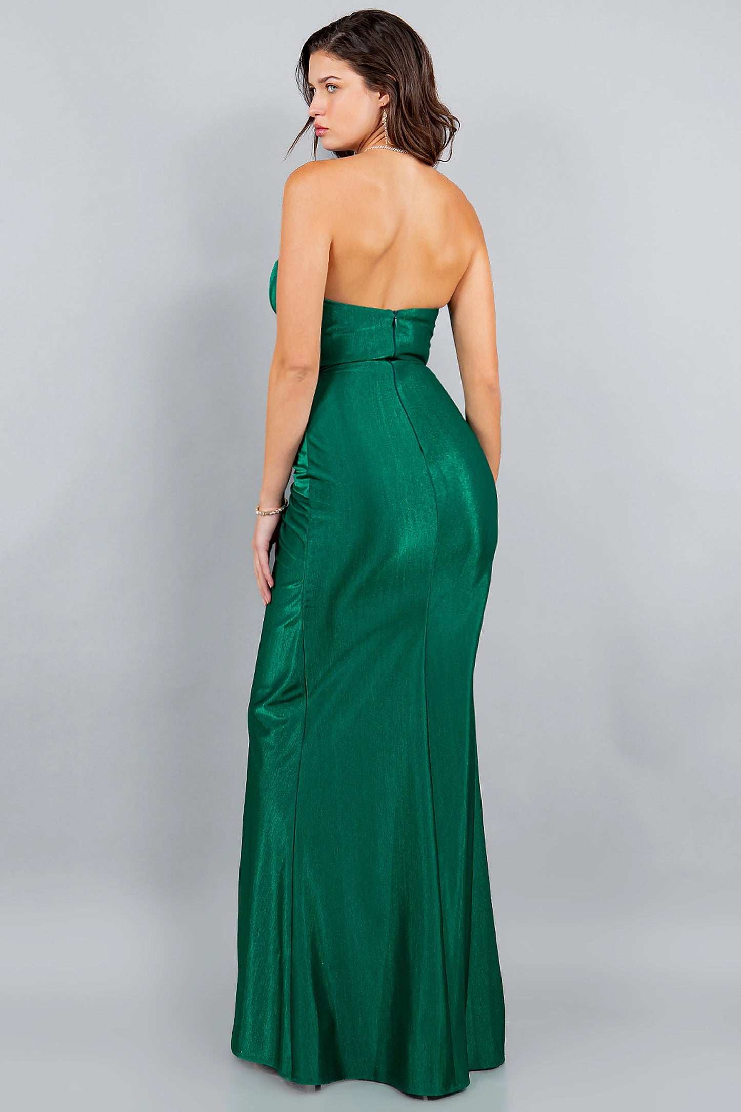 Green prom dress designed with zipper back closure