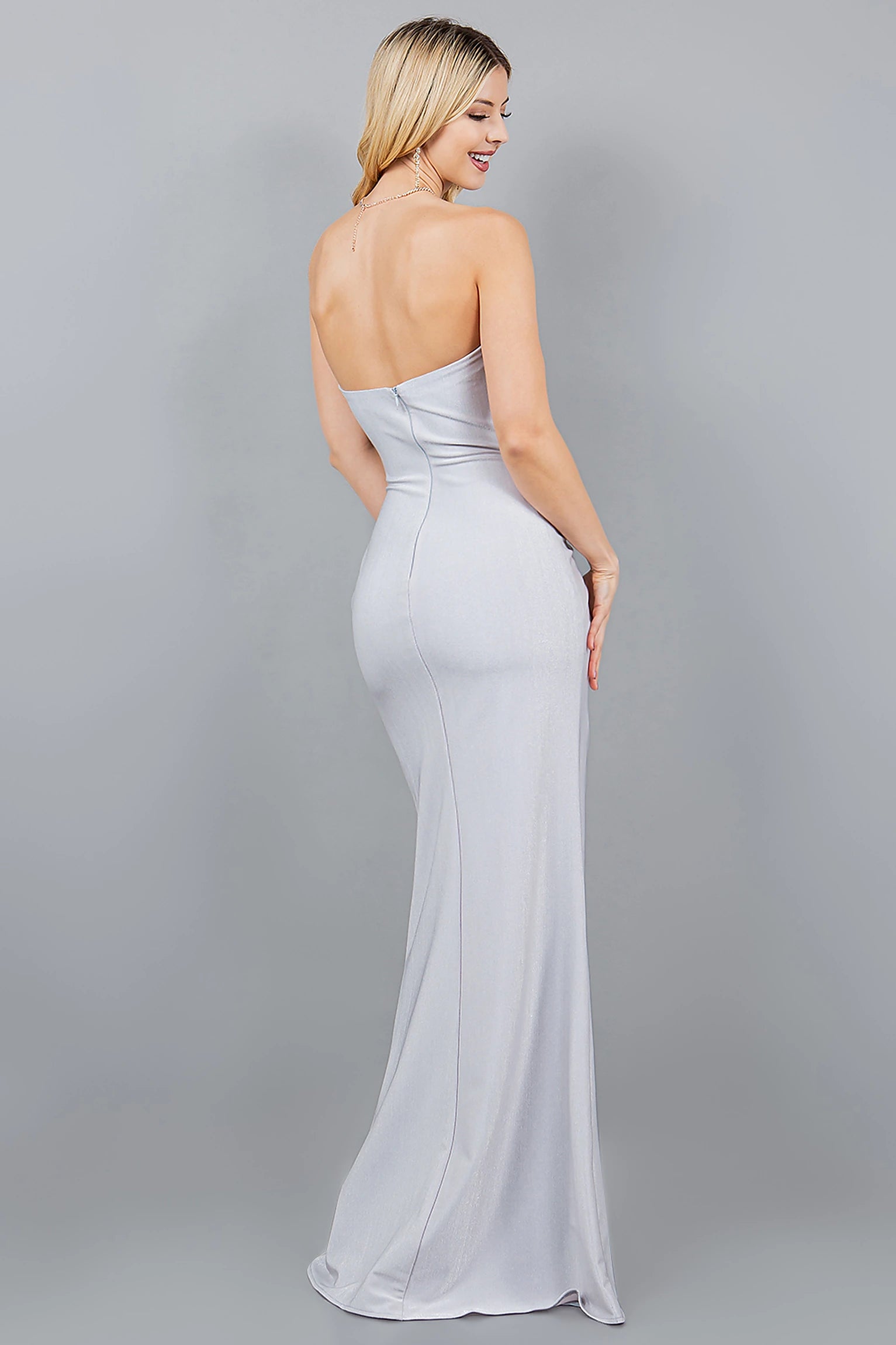 Silver prom dress designed with zipper back closure