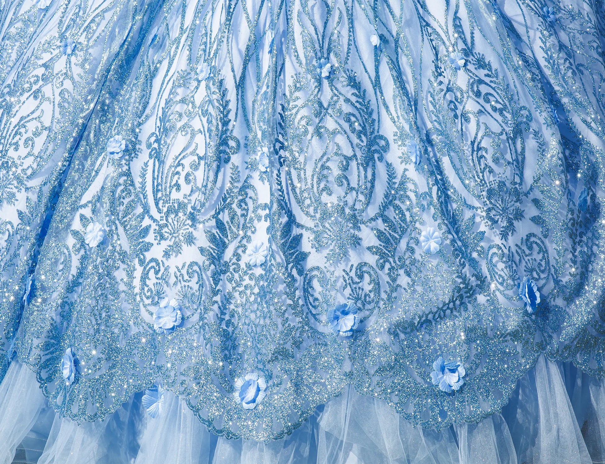 Close-up of a blue and white patterned fabric with intricate designs.