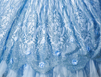 Close-up of a blue and white patterned fabric with intricate designs.
