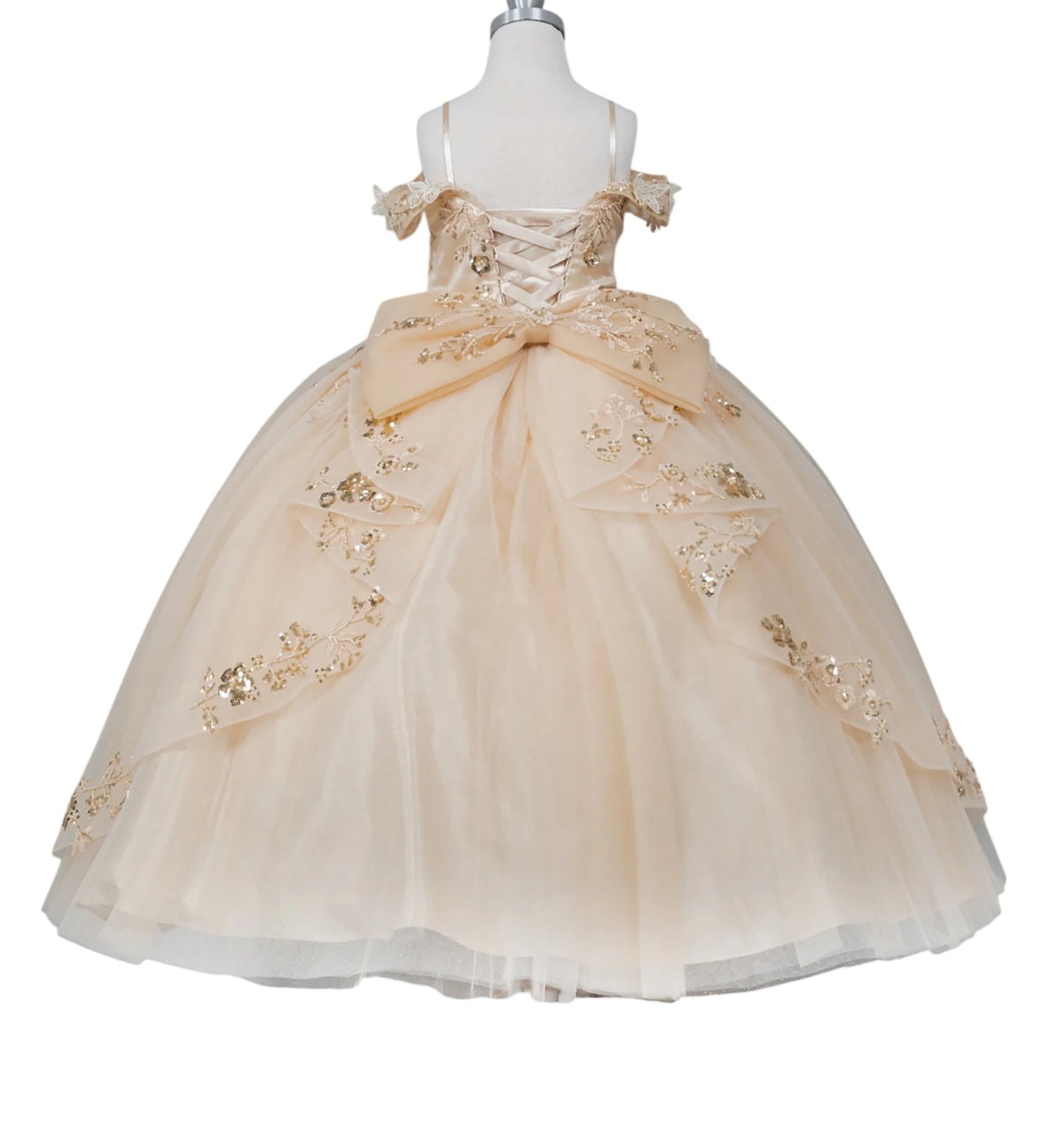 Champagne front view kids mini quinceañera mini quince dress with floral lace, gold embellishments and glitter tulle skirt.