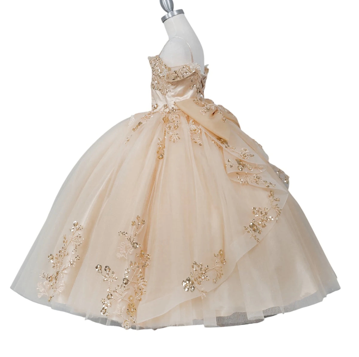 Champagne front view kids mini quinceañera mini quince dress with floral lace, gold embroidery and glitter tulle skirt.