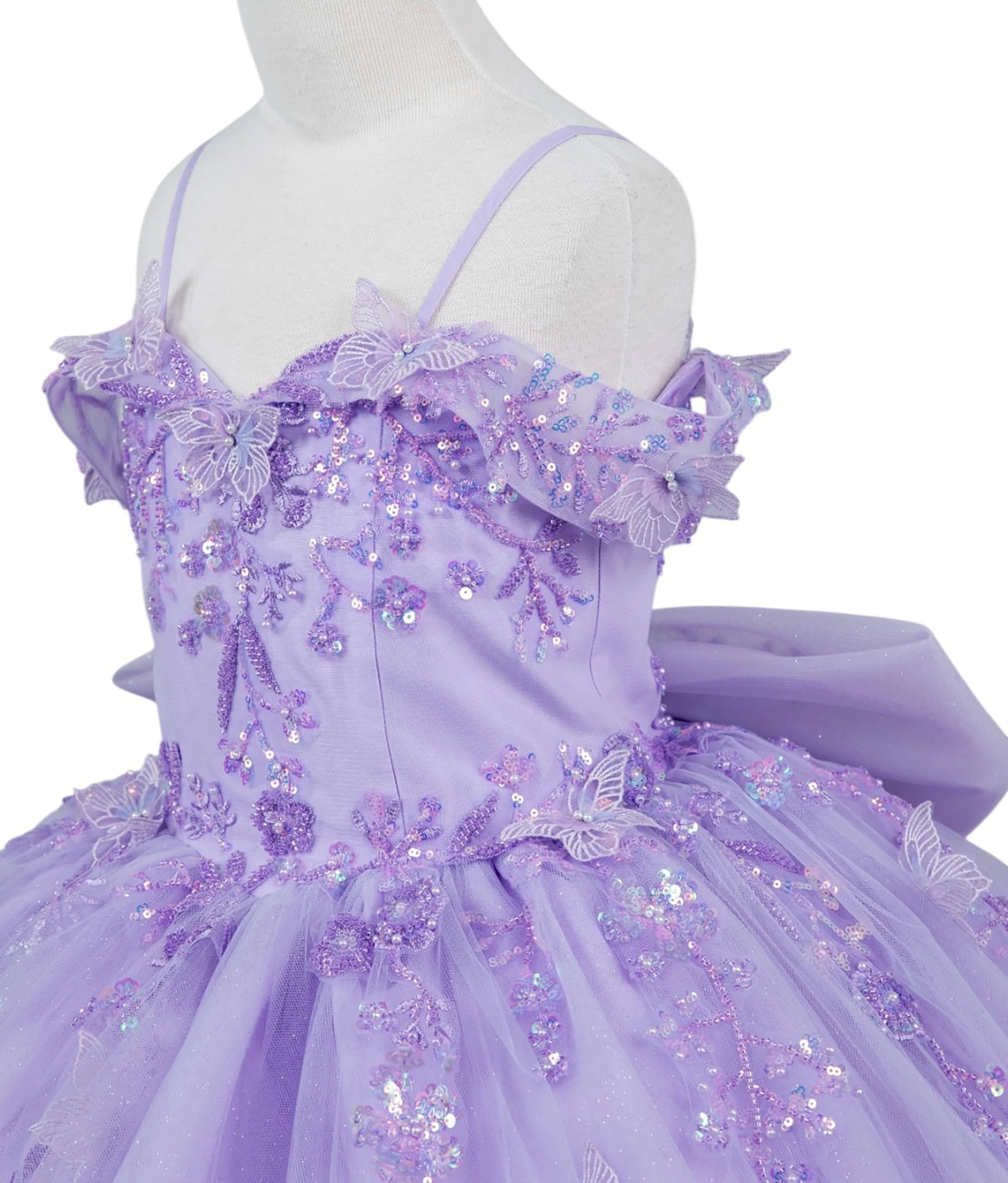 Lilac front view kids mini quinceañera mini quince dress with bead embroidered butterfly applique, floral lace and sweep train.