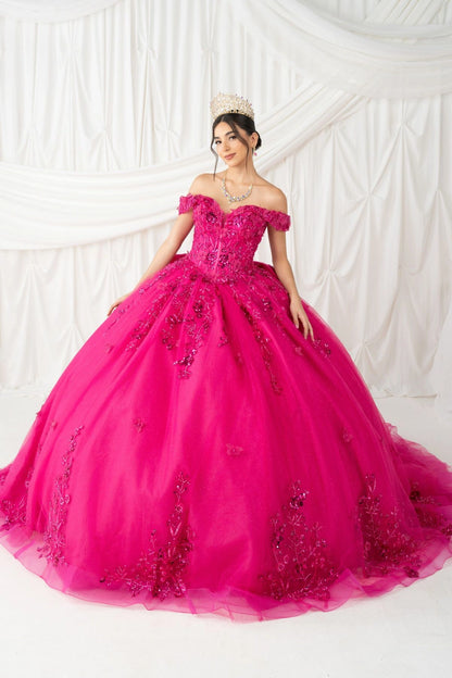 Displayed in a full-skirt front view, the Fuchsia quinceañera dress has off-shoulder beaded floral bodice and full glitter skirt.