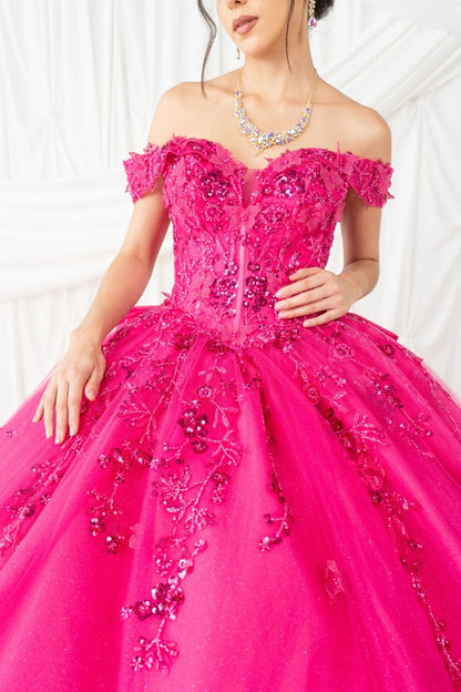 Presented in a bodice detail, the Fuchsia quinceañera dress has beaded floral bodice with off-shoulder sleeves.