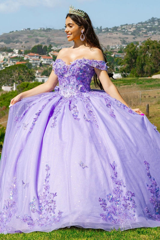 Shown in a full-skirt front view, the Lilac quinceañera dress has off-shoulder beaded floral bodice and butterfly skirt appliques.