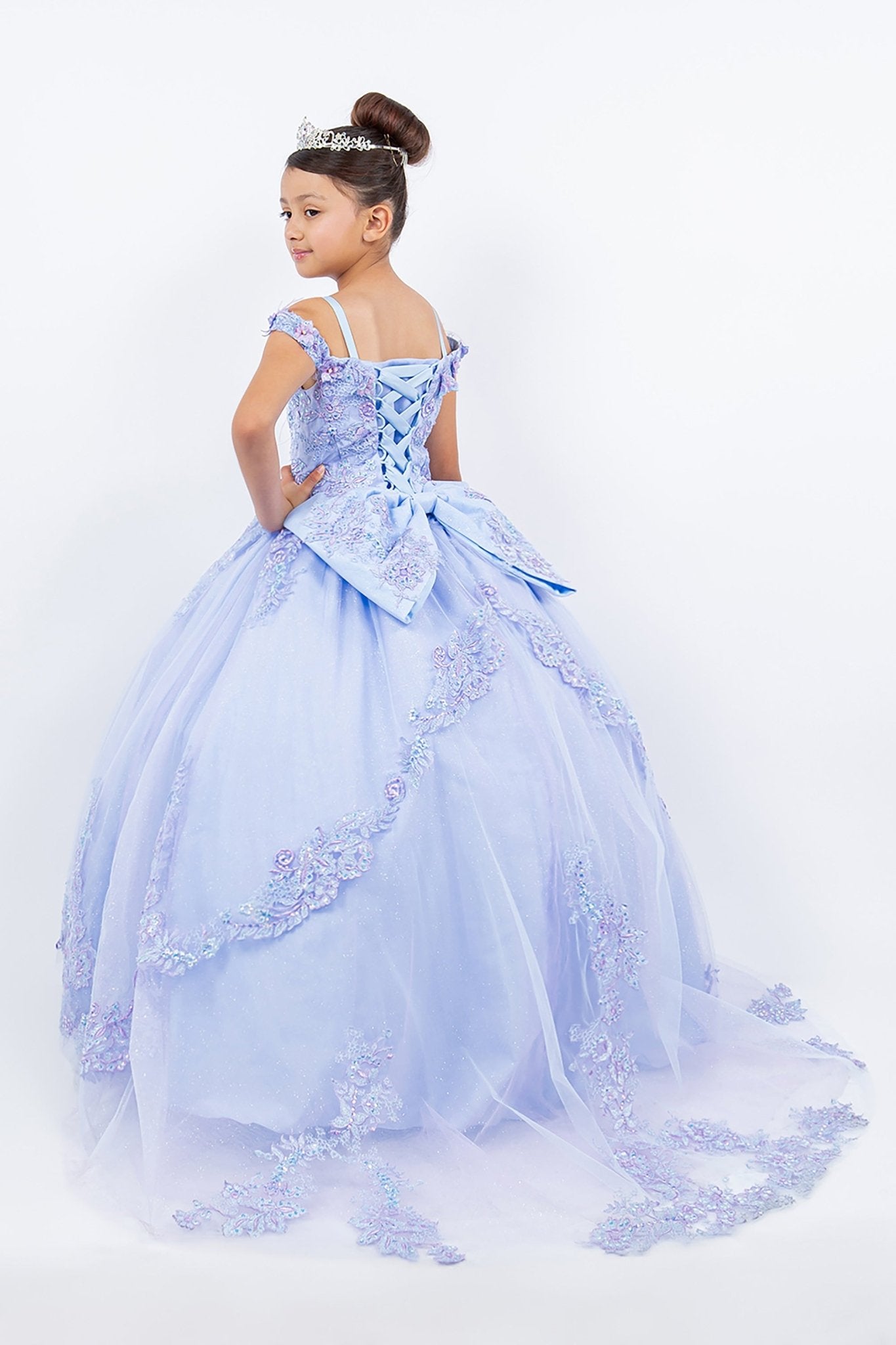 Lilac side back view kids mini quinceañera mini quince dress with two-tone embroidered corset, floral lace and long tulle train.