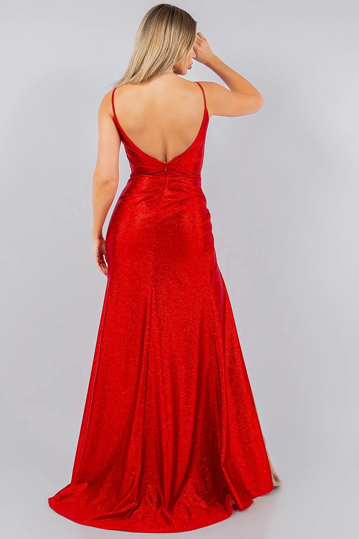 Red prom dress designed with metallic glitter fabric and zipper back closure 