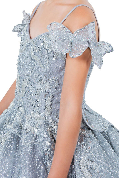 Detailed view highlights silver side zoom kids mini quinceañera mini quince dress with butterfly lace, beaded floral bodice.