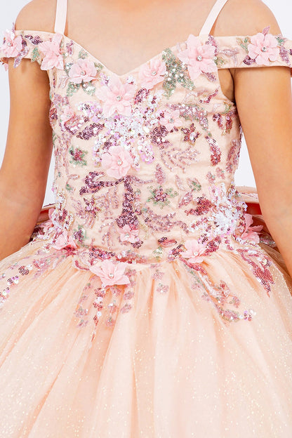 Detailed view highlights peach blush mini quince dress with sequin floral embroidery off-shoulder tulle straps.