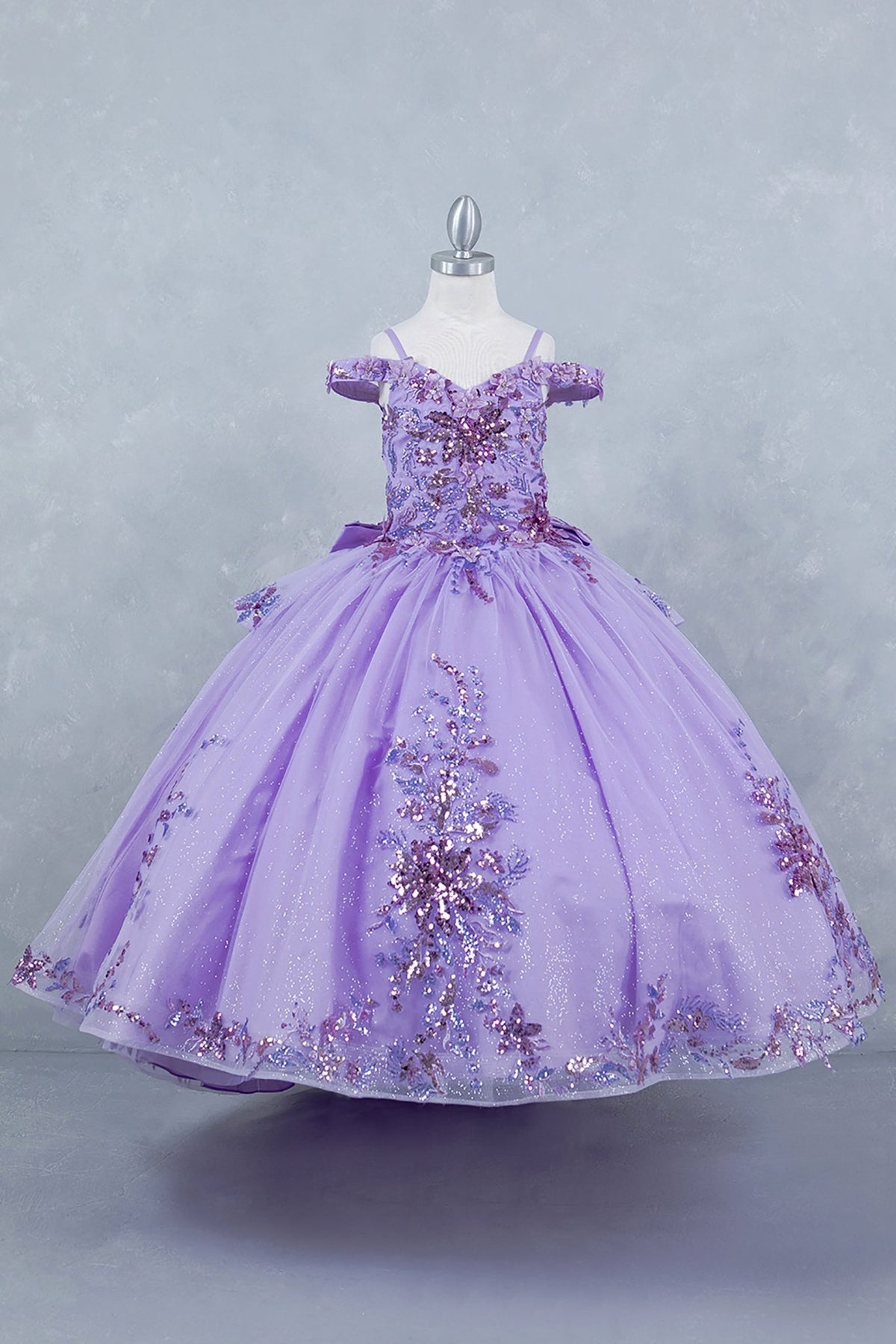 Lilac front view kids mini quinceañera mini quince dress with off-shoulder 3D beaded floral applique, glitter tulle and train.