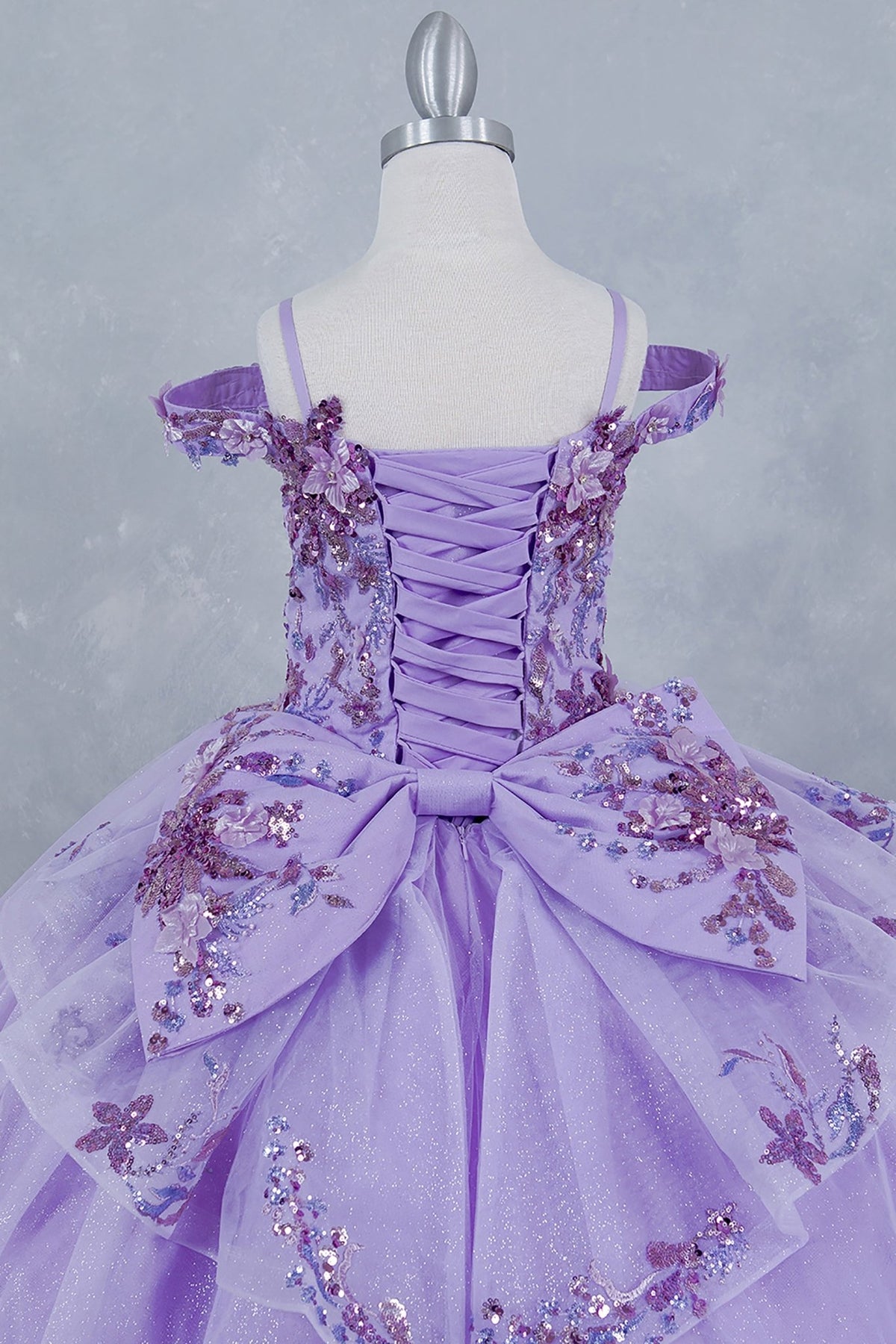 Lilac side zoom kids mini quinceañera mini quince dress with off-shoulder 3D beaded floral applique, glitter tulle and train.
