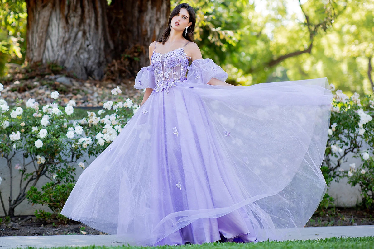 Skirt detail shows lilac prom dress completed with floor-length skirt and layered tulle skirt.