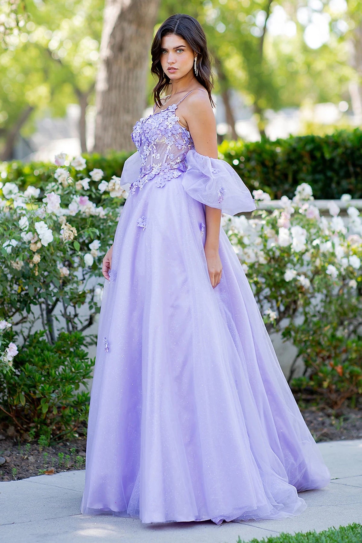 Intricate features stand out across lilac prom dress showcasing layered luxe tulle in A-line silhouette.