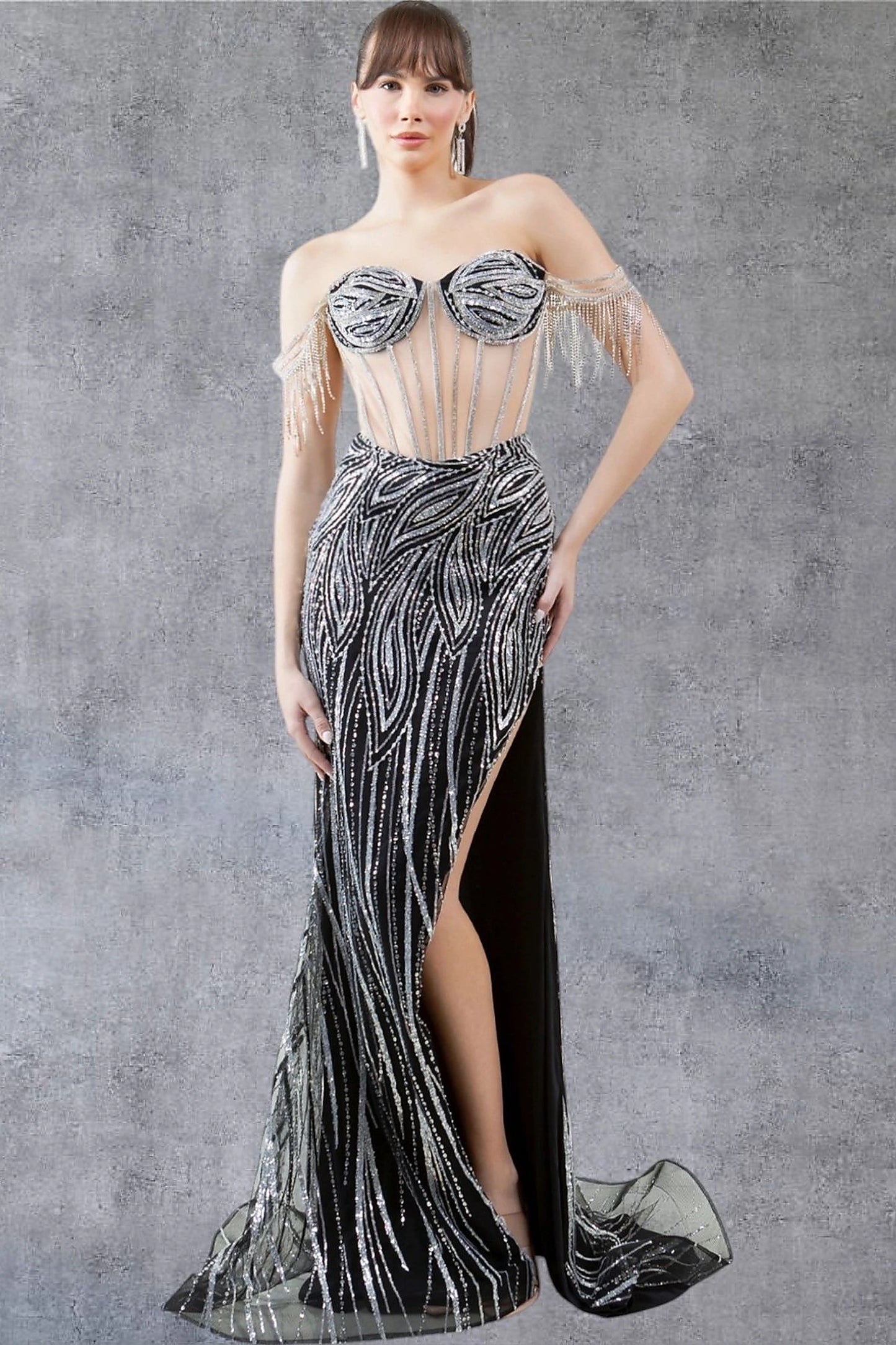 Black prom dress showcasing fitted skirt with silver beadwork patterns