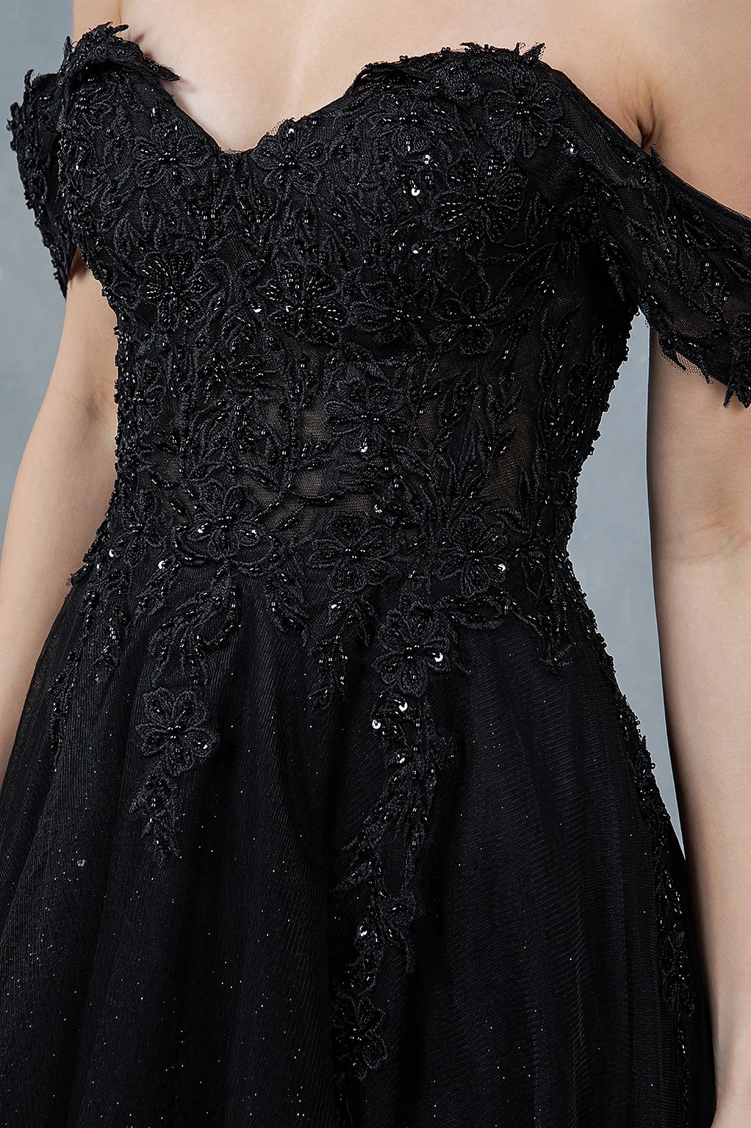 Black evening dress featuring lace embroidery with beadwork and sequins