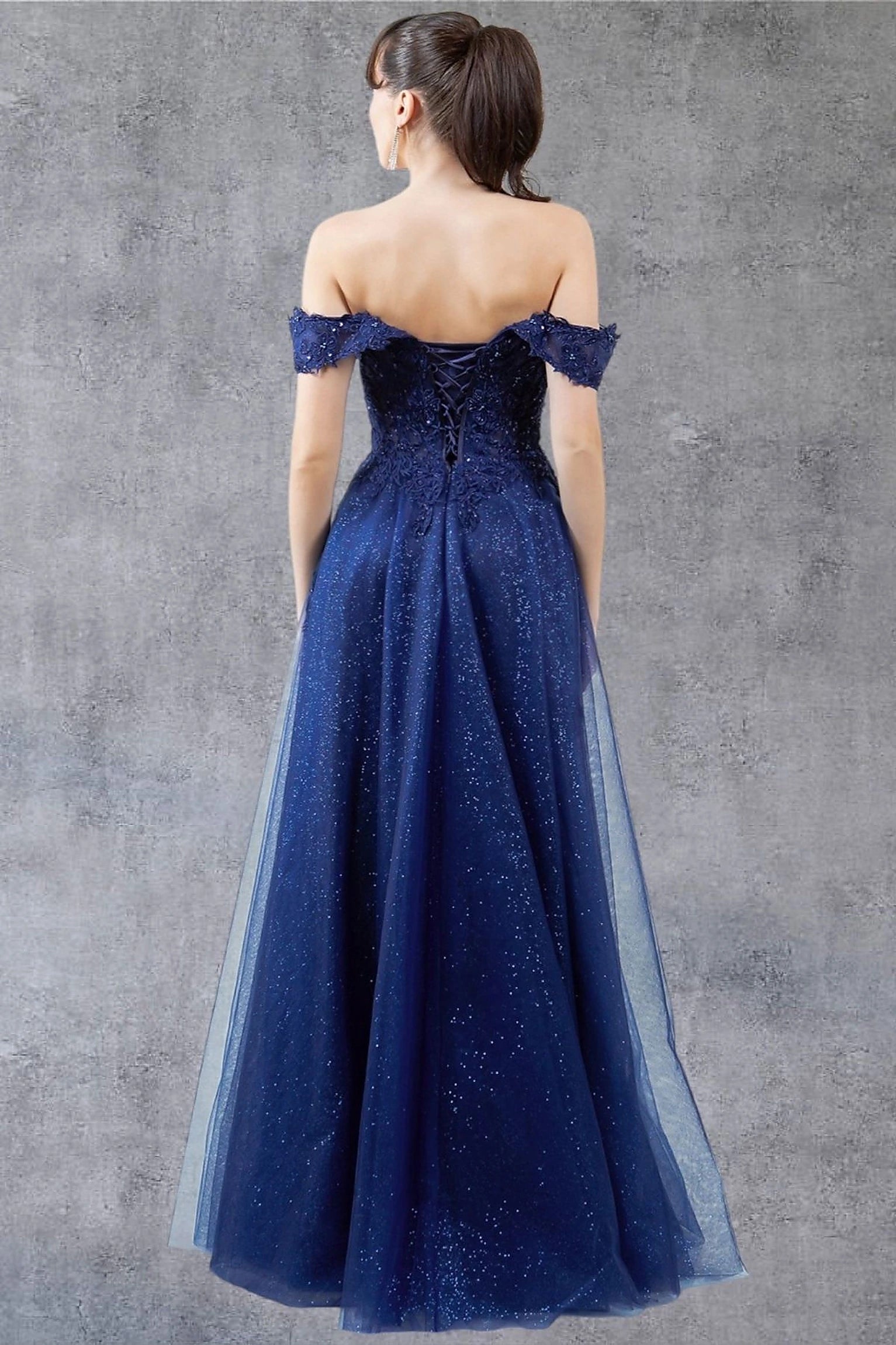 Navy evening dress showcasing voluminous silhouette with full skirt