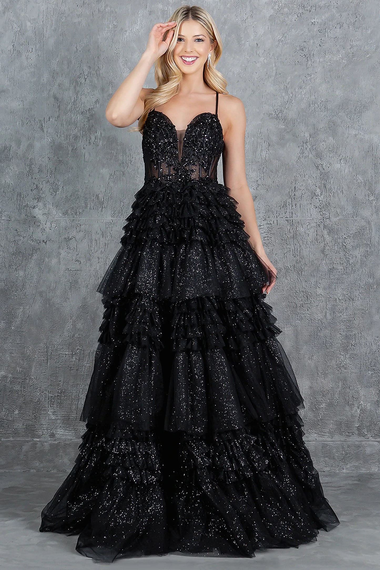 Black prom dress completed with voluminous silhouette and floor-length design