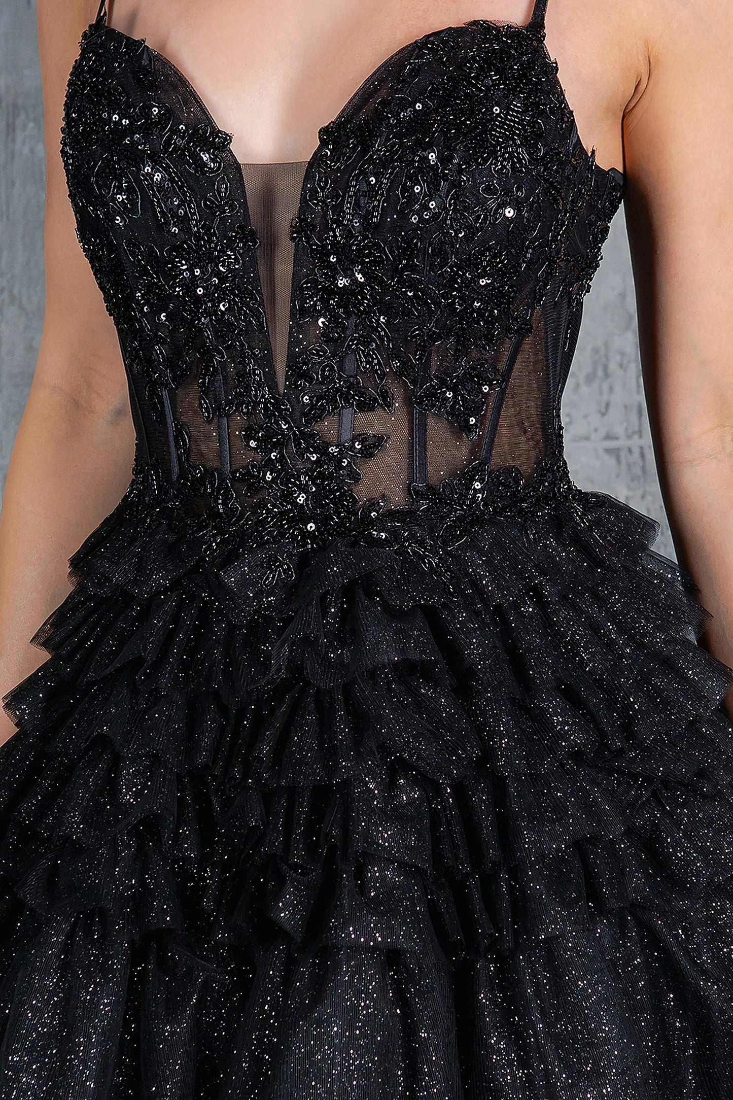 Black prom dress featuring embroidery, beads, sequins and floral embellishments
