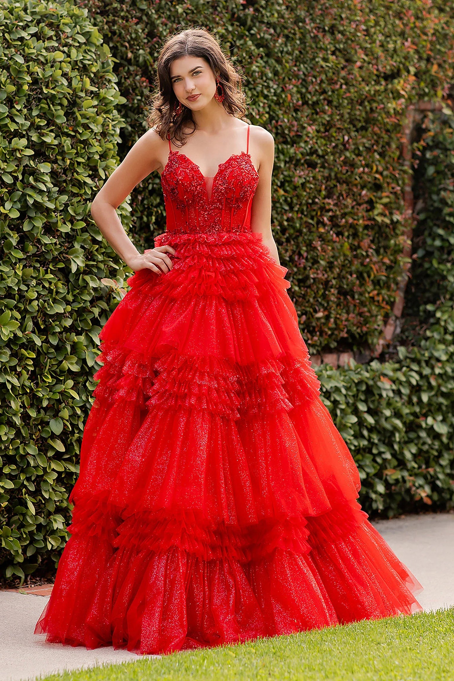 Red prom dress with deep sweetheart neckline and corset bodice
