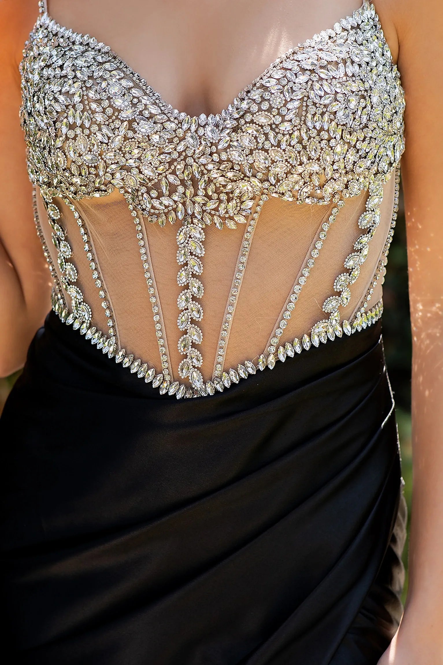 Black prom dress featuring crystal bead vine and floral patterns