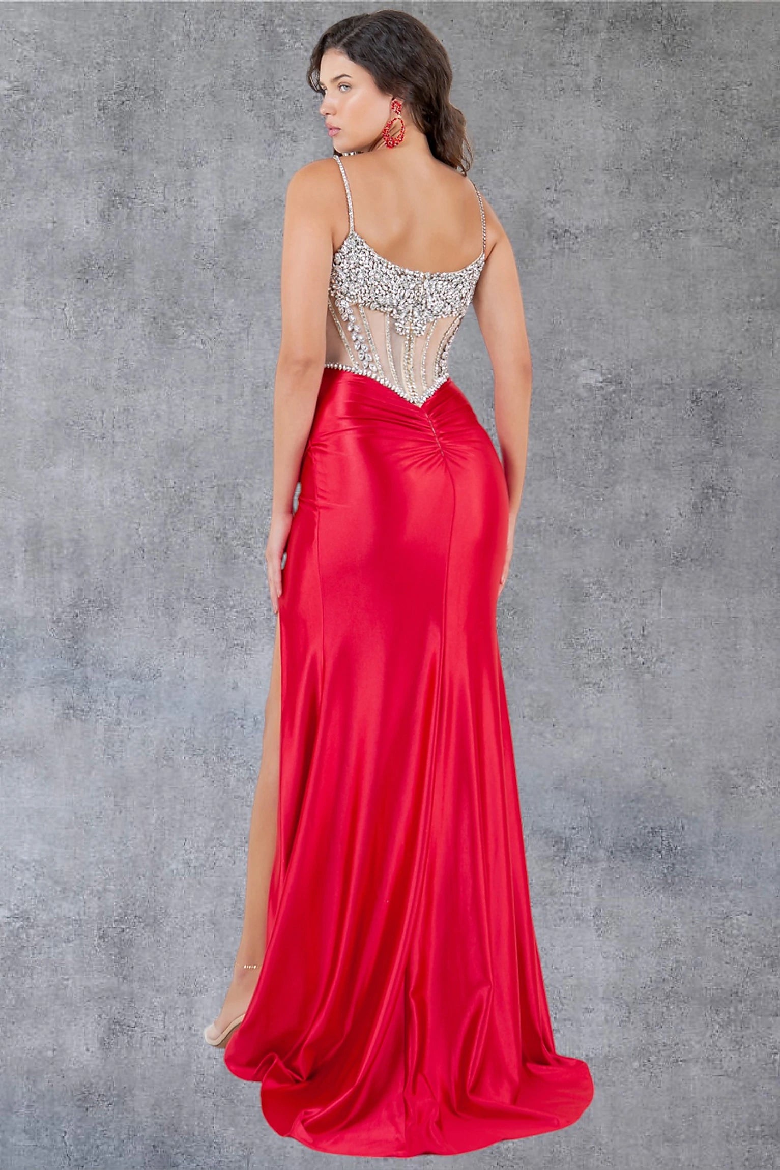 Red prom dress designed with zipper back closure