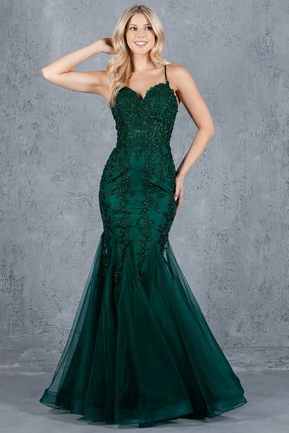 Full front view of a women wearing green mermaid prom dress with embroidered corset bodice and tulle overlay.