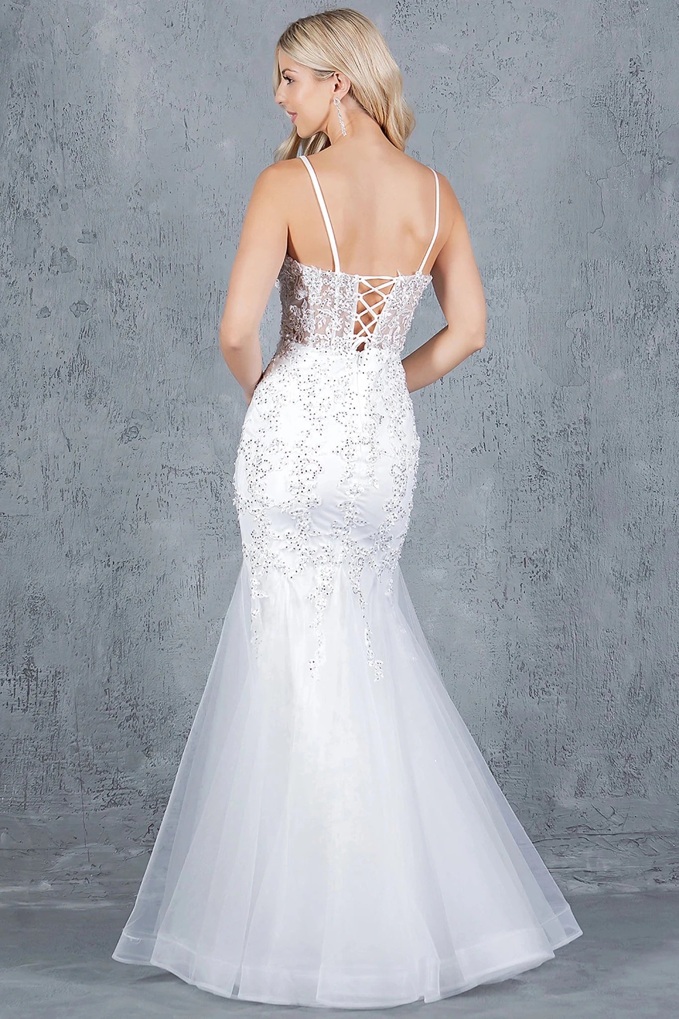 Off White mermaid gown completed with crisscross lace-up back and zipper closure