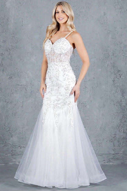 Intricate features stand out across off White mermaid gown showcasing tulle overlay flaring from hips into mermaid silhouette.