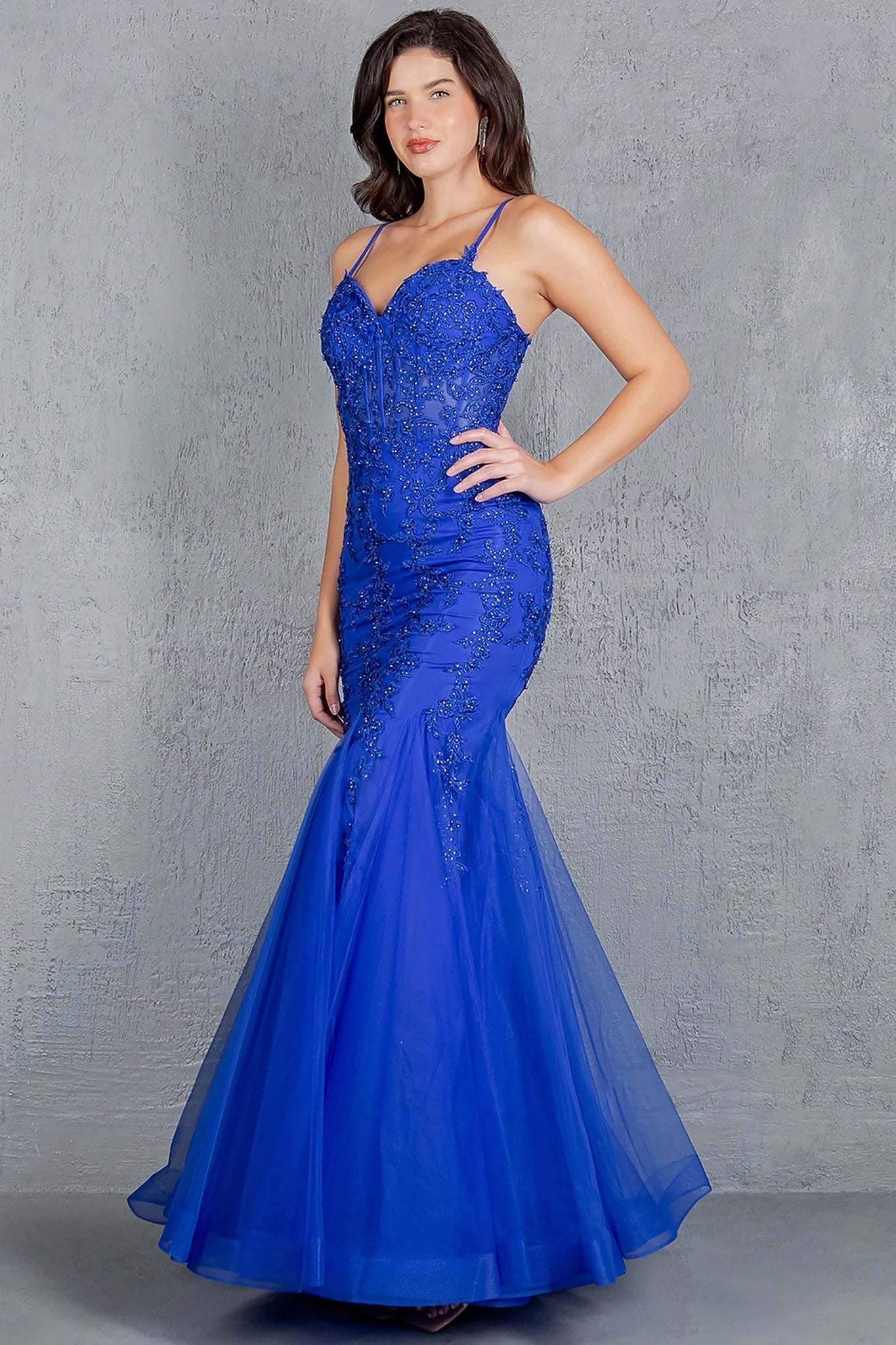 Royal Blue mermaid gown showcasing tulle overlay flaring from hips into mermaid silhouette